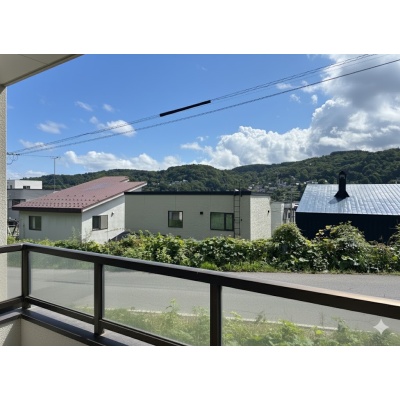 敷地写真を元に建築イメージを合成したものです。